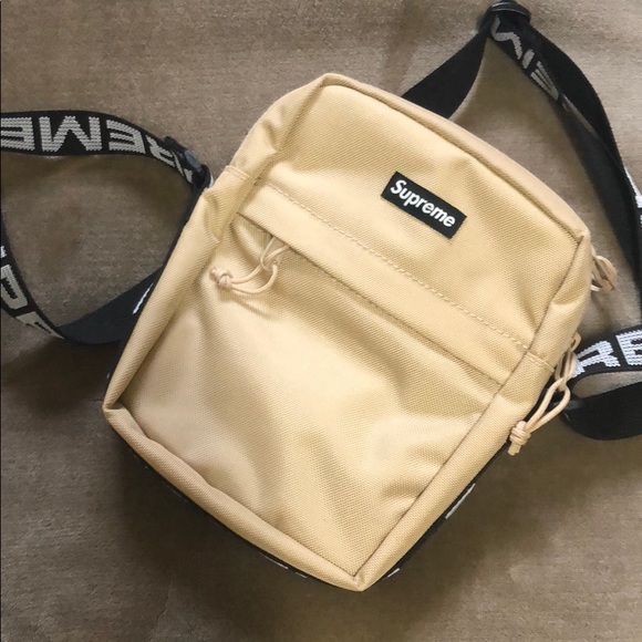 tan supreme bag